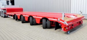 A trailer with hydraulic steering system and controls